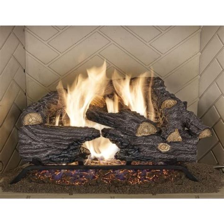 Can I use real logs in a gas fireplace