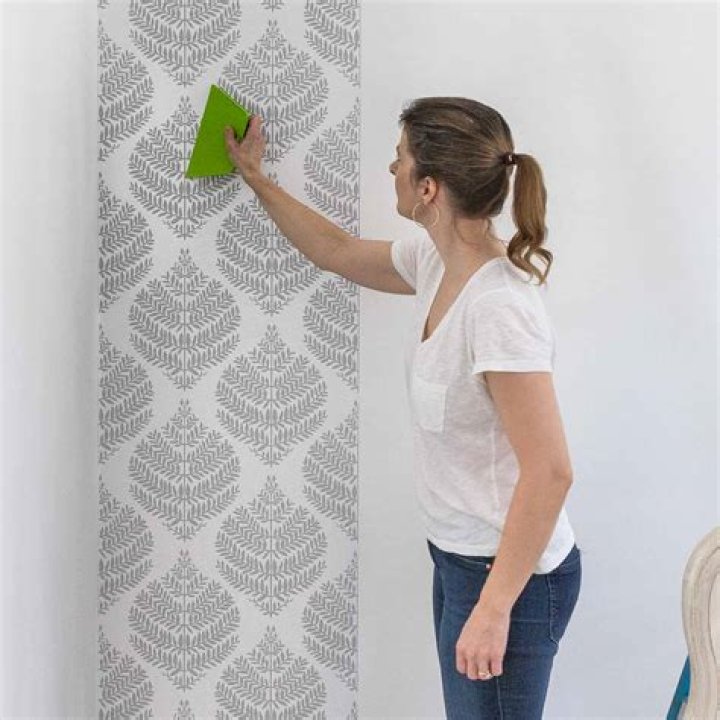 Can you use spray adhesive to hang wallpaper