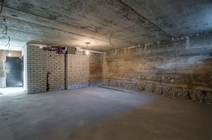How can I cover my basement walls