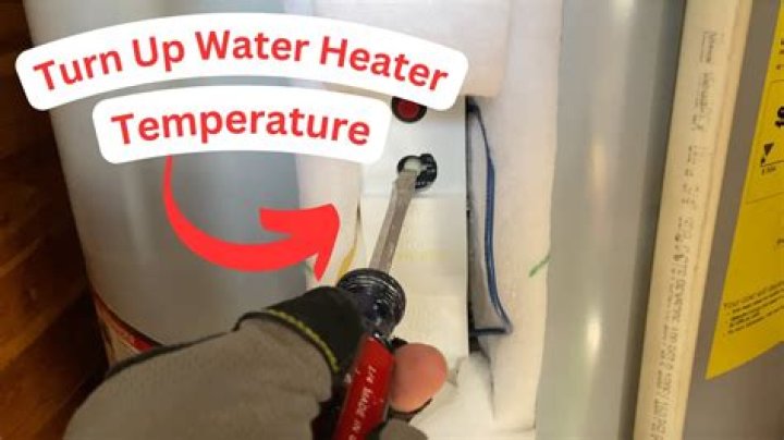 How do I adjust the temperature on my whirlpool hot water heater