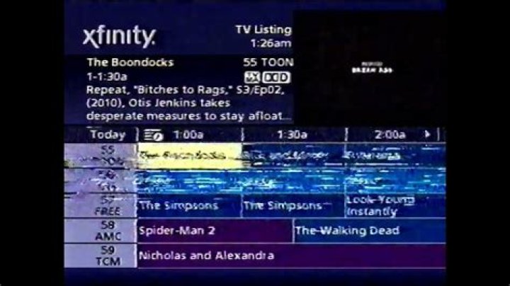 How do I fix my Comcast zoomed in TV