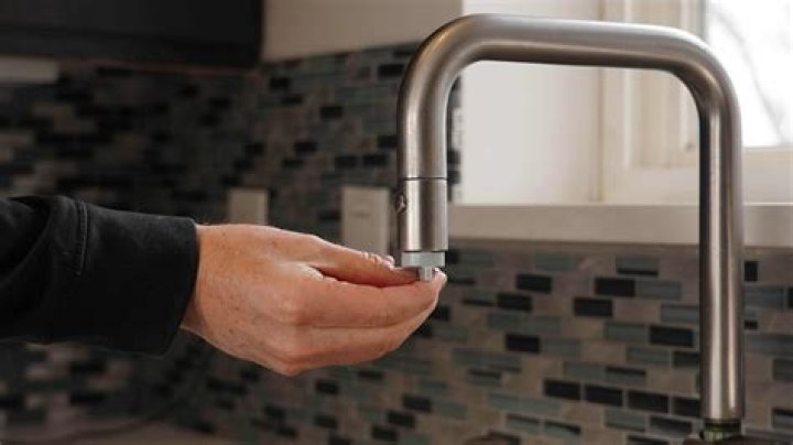 How do I remove the aerator from my Kohler pull down faucet?