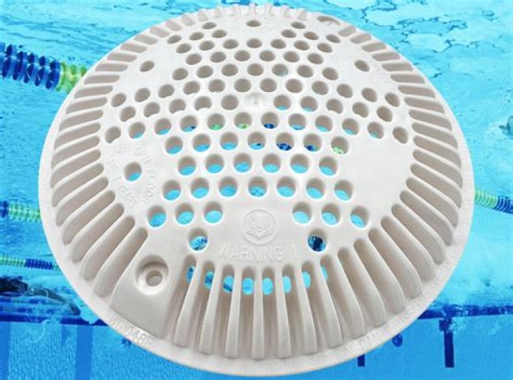 How do you clean a pool drain cover