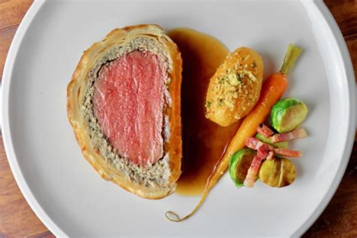 How do you keep the bottom of Beef Wellington from getting soggy