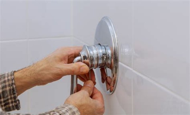 How do you seal a leaking shower plug?