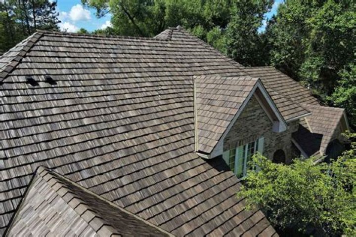 How much does it cost to replace a wood shingle roof