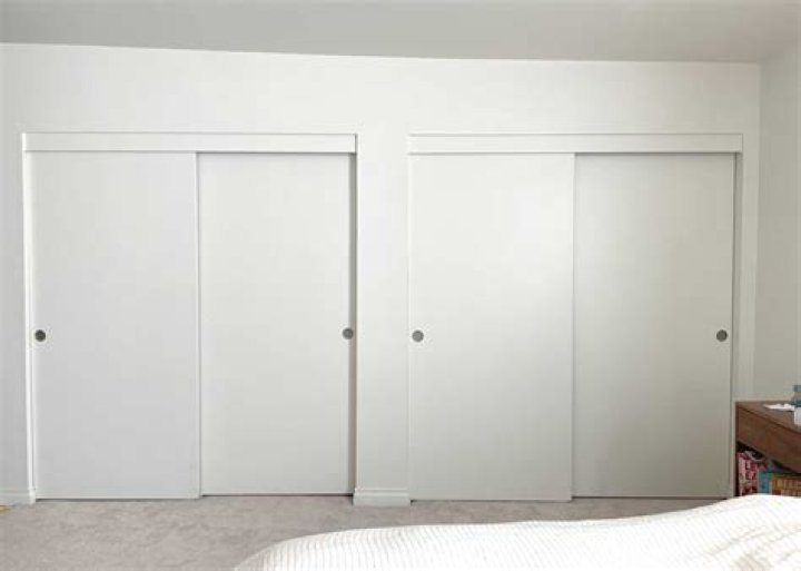 How much should sliding wardrobe doors overlap