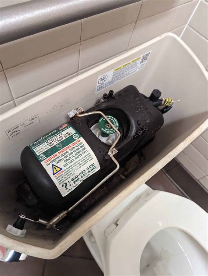 What happens when you flush a toilet with Flushmate?