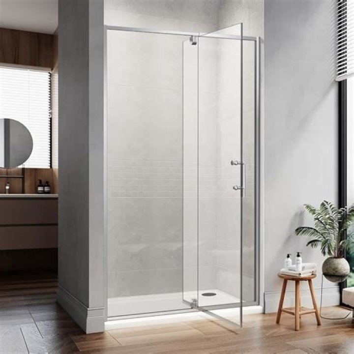 What is a pivoting shower door
