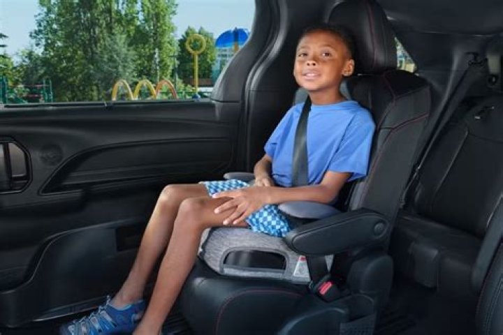 When can I put my child in a booster seat in Washington state