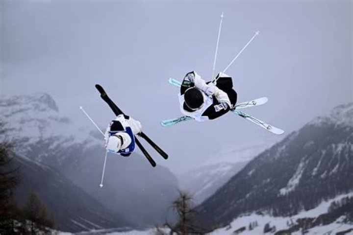 Which sport features Acro aerials and moguls